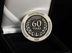 Монет юбилейная "60 лет"